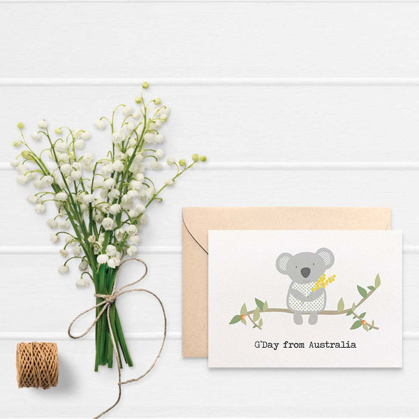 Koala holding wattle Greeting Card by mumandmehandmadedesigns- An Australian Online Stationery and Card Shop