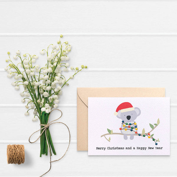 Koala with Christmas Lights Greeting Card by mumandmehandmadedesigns- An Australian Online Stationery and Card Shop